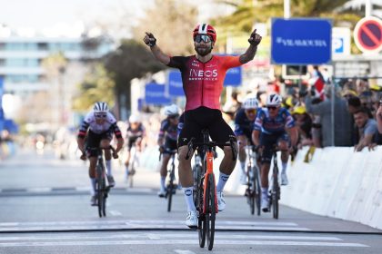 Filippo Ganna of Italy celebrates at finish line before the stage was scrapped.