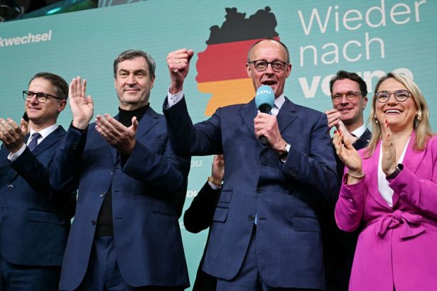 CDU leader Friedrich Merz addresses supporters in Berlin on Sunday evening after the first exit polls were announced.