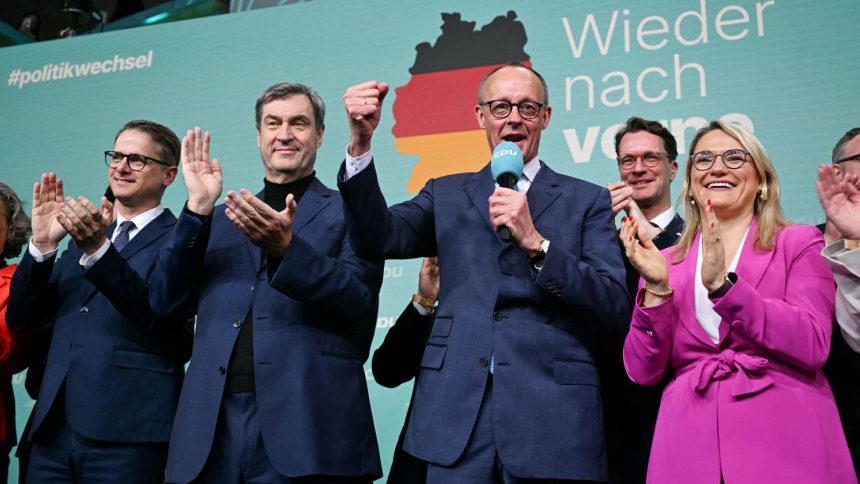 CDU leader Friedrich Merz addresses supporters in Berlin on Sunday evening after the first exit polls were announced.