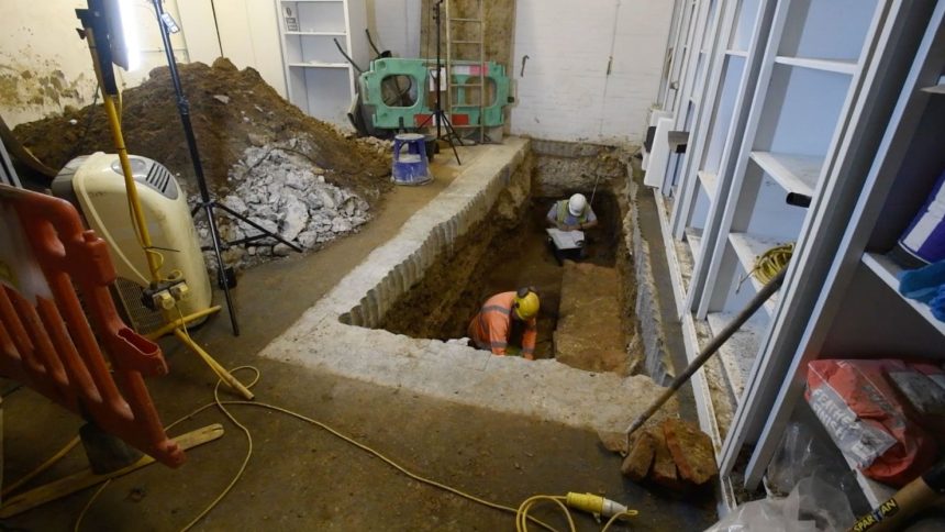 Archaeologists pictured during excavation works at the site.