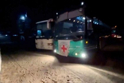 CNN video shows International Committee of the Red Cross buses heading to the Kerem Shalom crossing.