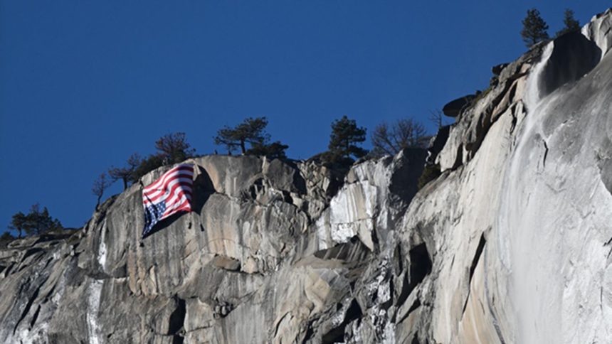 The American flag is seen unfurled upside down at Yosemite National Park, California, on Saturday, February 22, 2025.