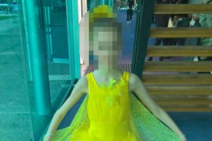 Images tendered to the court showed the girl in colorful ballet costumes. CNN has obscured the girl's face to protect her identity.