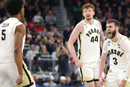 Braden Smith (No. 3) of the Purdue Boilermakers celebrates a basket with his teammates against the High Point Panthers.