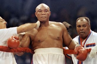 George Foreman, a former heavyweight boxing champion seen here in 1991, died on Friday.