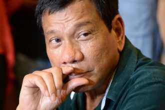 Philippine President-elect Rodrigo Duterte speaks during his first press conference since he claimed victory in the presidential election, at a restaurant in Davao City, on the southern island of Mindanao on May 15, 2016.