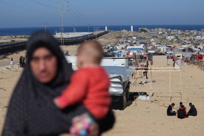 Displaced Palestinians seek shelter near the border with Egypt, in Rafah in the southern Gaza Strip, January 7, 2024