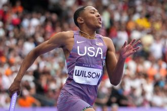 Quincy Wilson competes in the 4x400-meter relay heats at last year's Paris Olympics.