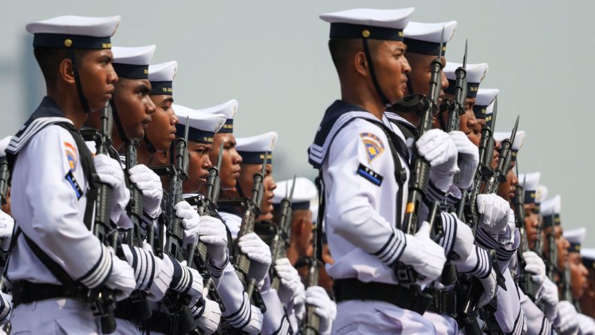 Indonesian Navy personnel march at the National Monument (Monas) complex in Jakarta, Indonesia on October 5, 2024.