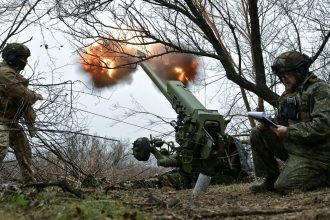 Ukrainian troops fire towards Russian positions in Zaporizhzhia region, Ukraine, on January 11, 2025.