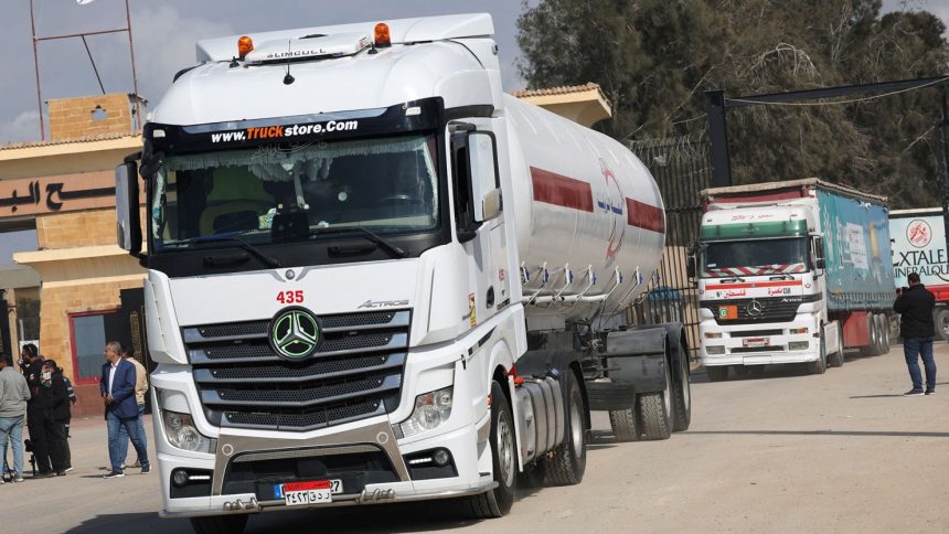 A truck moves from the Gaza Strip through the Rafah border crossing on the Egyptian side, in Rafah, Egypt on February 11.