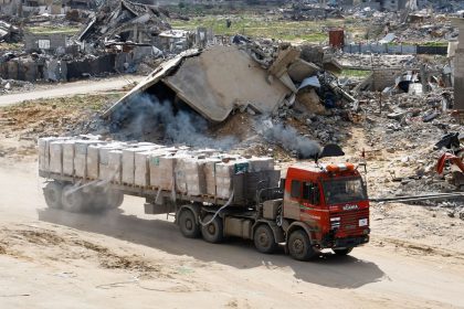 A truck carrying aid drives in Rafah in the southern Gaza Strip, on February 16, 2025.