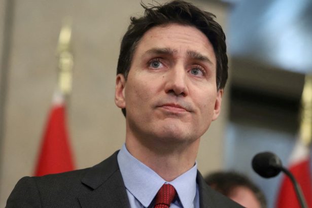 FILE PHOTO: Canada's Prime Minister Justin Trudeau looks on during a press conference while responding to U.S. President Donald Trump's orders to impose 25% tariffs on Canadian imports, in Ottawa, Ontario, Canada February 1, 2025. REUTERS/Patrick Doyle/File Photo