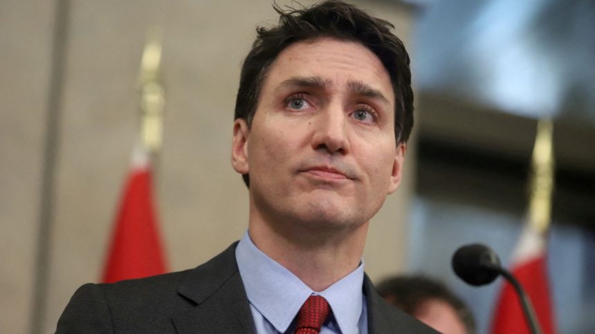 FILE PHOTO: Canada's Prime Minister Justin Trudeau looks on during a press conference while responding to U.S. President Donald Trump's orders to impose 25% tariffs on Canadian imports, in Ottawa, Ontario, Canada February 1, 2025. REUTERS/Patrick Doyle/File Photo