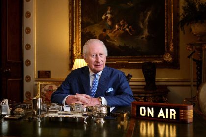 Britain's King Charles poses in his office where "The King's Music Room" recording takes place in Buckingham Palace, London, in this undated handout photo from Apple Music.