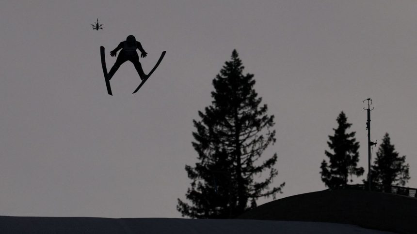 Marius Lindvik is seen competing in the men's large hill competition on Saturday.