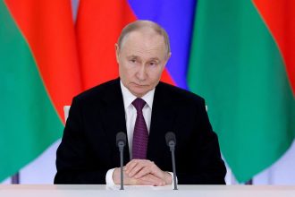 Russian President Vladimir Putin gives a news conference following a meeting with his Belarusian counterpart Alexander Lukashenko in Moscow, Russia, on Thursday.