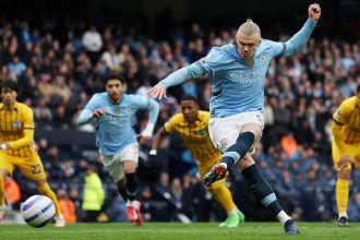 Erling Haaland gave Manchester City a 1-0 lead with a record-breaking penalty.