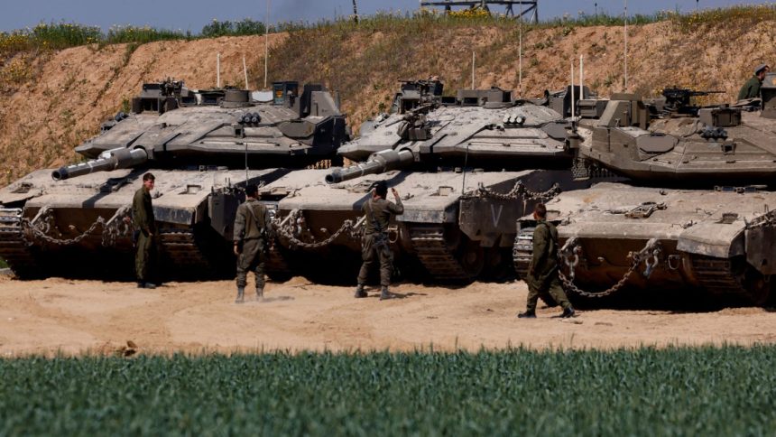 Israeli tanks were seen positioned near the Israel-Gaza border on Tuesday.