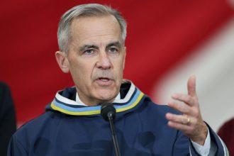 Canada's Prime Minister Mark Carney speaks to the press in Iqaluit, Nunavut, Canada on March 18.