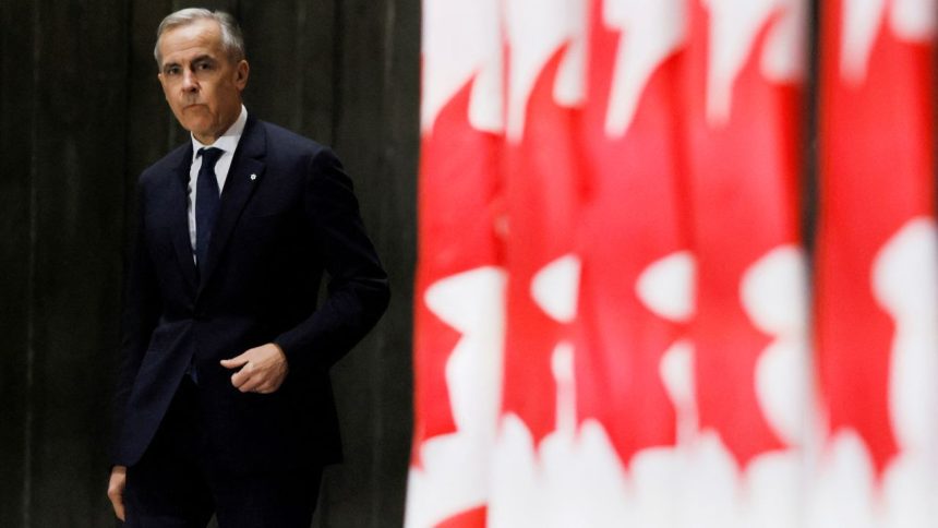 Canada's Prime Minister Mark Carney arrives to a press conference after meeting with provincial and territorial leaders at the Canadian War Museum in Ottawa, Ontario, Canada March 21, 2025.