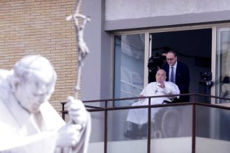 Pope Francis makes his first public appearance in five weeks, on the day he is set to be discharged from Gemelli Hospital, in Rome, Italy, March 23, 2025. REUTERS/Remo Casilli