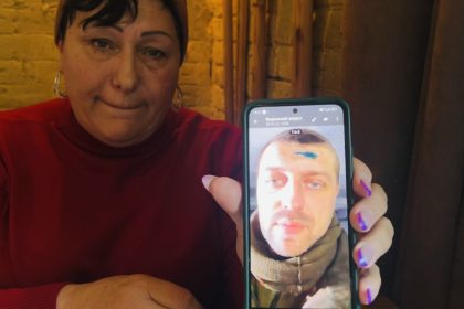 Valentyna Ocheretnaya shows the last photo she has of her son, Nazar Ocheretnyi, sent by him in March 2022 from Mariupol. She was informed two weeks later that he was "missing in action."