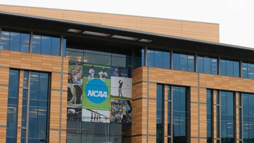 NCAA logo and signage are displayed outside the National Collegiate Athletic Association headquarters in Indianapolis.