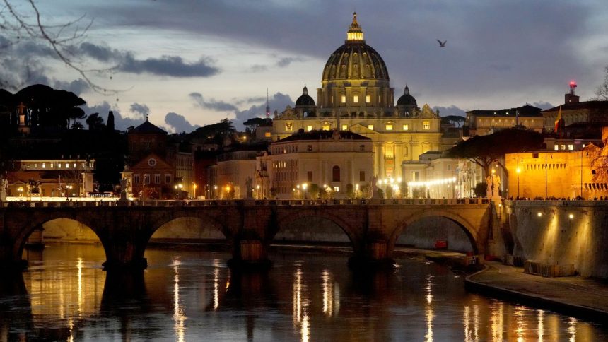 St. Peter's Basilica at The Vatican is seen at dusk in Rome, Italy on February 28.