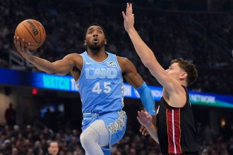 Cleveland Cavaliers guard Donovan Mitchell goes to the basket against the Miami Heat on Wednesday.