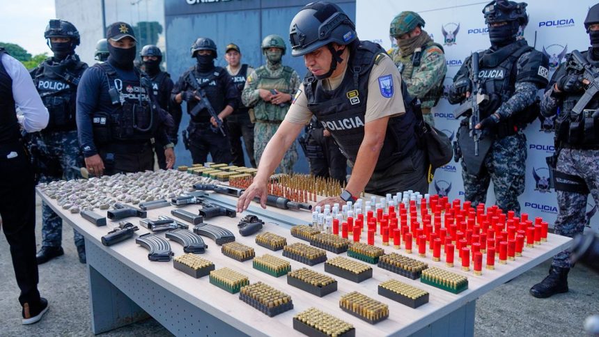 Ecuadorian police display weapons and ammunition seized after a deadly armed attack in Guayaquil.