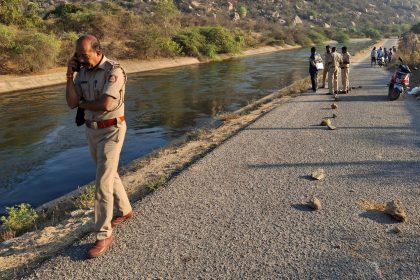 Police officers at the scene where three men are accused of gang-raping two women, in Koppal district of southern state of Karnataka, India, on Friday, March 7, 2025.