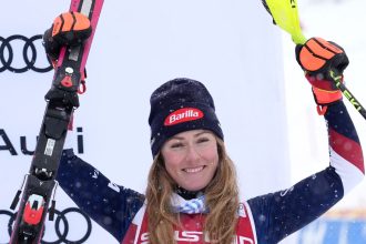 Mikaela Shiffrin celebrates her third place finish.