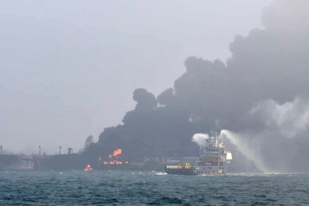 A firefighting ship tries to extinguish the blaze after Monday's collision in the North Sea.