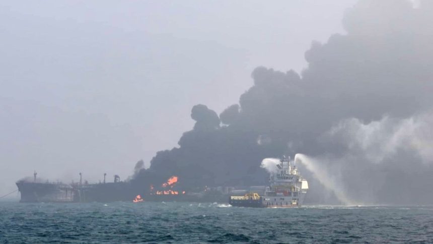 A firefighting ship tries to extinguish the blaze after Monday's collision in the North Sea.