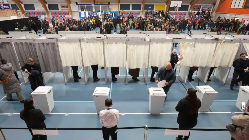 Voters lining up to cast their ballots in parliamentary elections in Nuuk, Greenland, on March 11, 2025.