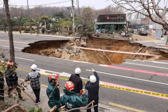 The sinkhole in Seoul pictured on Tuesday.