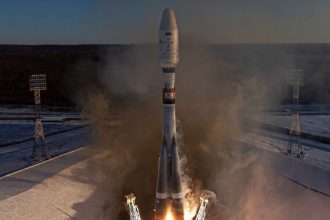 In this photograph distributed by the Russian state agency Sputnik, a Russian Soyuz-2.1b rocket with a Fregat upper stage carrying two Ionosfera-M satellites and an additional payload of 53 Russian and foreign mini-satellites blasts off from the launchpad at the Vostochny Cosmodrome in Amur Region, Russia, on November 5, 2024.