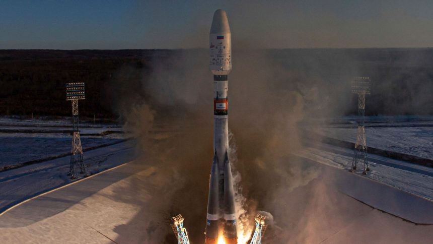 In this photograph distributed by the Russian state agency Sputnik, a Russian Soyuz-2.1b rocket with a Fregat upper stage carrying two Ionosfera-M satellites and an additional payload of 53 Russian and foreign mini-satellites blasts off from the launchpad at the Vostochny Cosmodrome in Amur Region, Russia, on November 5, 2024.