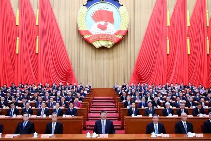 Chinese leader Xi Jinping, center, attends a meeting at Beijing's Great Hall of the People during China's annual two sessions political gathering last March.