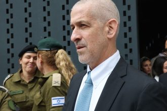 Ronen Bar, chief of Israel's domestic Shin Bet security agency, attends a ceremony marking Memorial Day for fallen soldiers of Israel's wars and victims of attacks at Jerusalem's Mount Herzl military cemetery on May 13, 2024.