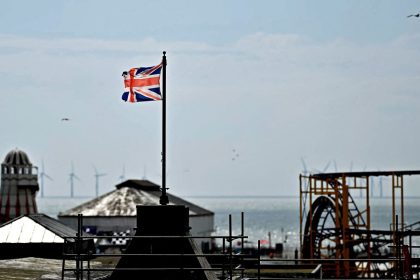 A Union Jack flag flies from a pole above Clacton Pier in Clacton-on-Sea, eastern England, on June 4, 2024.