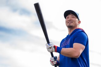 Seiya Suzuki of the Chicago Cubs works out during Spring Training at Sloan Park on February 13, 2025.