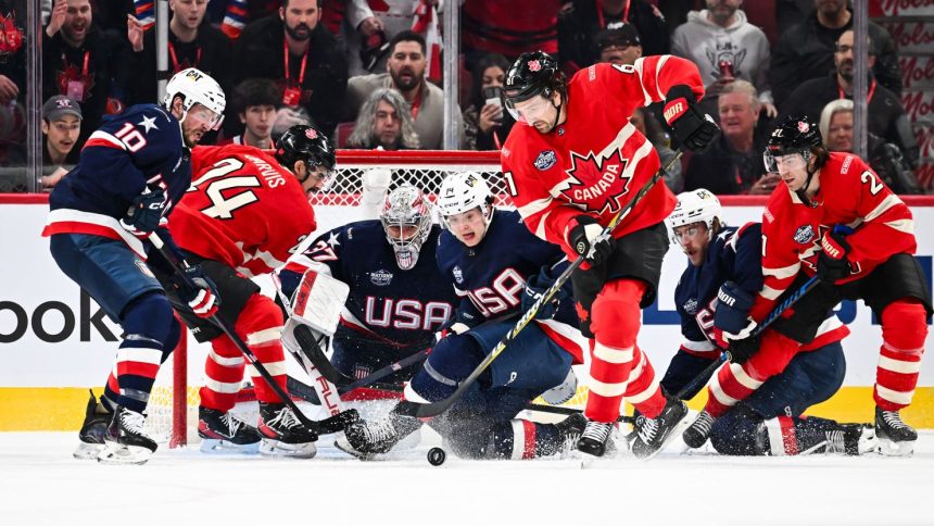 MONTREAL, CANADA - FEBRUARY 15:  Goaltender Connor Hellebuyck #37 and teammate Brock Faber #14 of Team USA defend against Mark Stone #61 of Team Canada during the first period in the 2025 NHL 4 Nations Face-Off at the Bell Centre on February 15, 2025 in Montreal, Quebec, Canada. Team USA defeated Team Canada 3-1.  (Photo by Minas Panagiotakis/Getty Images)