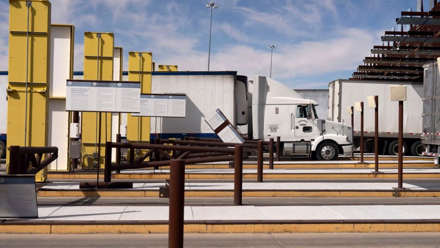 Tractor trailers carrying products from Mexico in the primary cargo inspection lane at the Nogales-Mariposa port of entry on the US-Mexico border. President Donald Trump has imposed a 25% tariff on Mexican imports.