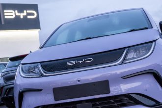 Brand new BYD electric cars are displayed for sale outside a BYD dealership, on February 20, 2025 in Bristol, England.