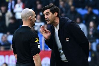 Fonseca approaches referee Benoit Millot at the end of the game between Lyon and Brest.