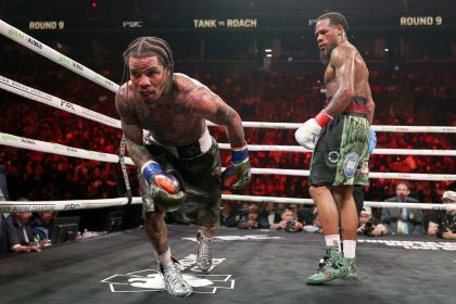 Davis takes a knee in his lightweight title fight against Roach.