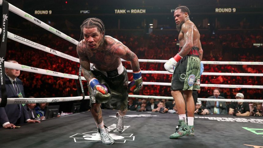 Davis takes a knee in his lightweight title fight against Roach.