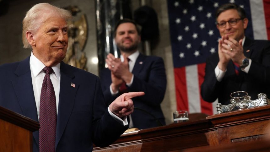 US Vice President JD Vance and Speaker of the House Mike Johnson (R-LA) applaud as US President Donald Trump speaks during an address to a joint session of Congress in the House Chamber of the US Capitol in Washington, DC, on March 4, 2025. (Photo by Win McNamee / POOL / AFP) (Photo by WIN MCNAMEE/POOL/AFP via Getty Images)